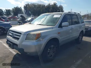 2008 Honda Pilot EX-L with VIN 5FNYF28558B012817, listed as a IAAI auction lot 41353216 with 233,854 mi miles. Bid and sale history available at carsss.com. Image 2.