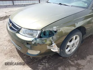 1999 Toyota Solara SE with VIN 2T1CF22PXXC247611, listed as a IAAI auction lot 41863240 with 153,823 mi miles. Bid and sale history available at carsss.com. Image 6.