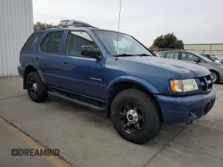 2003 Isuzu Rodeo z VIN 4S2DM58W234305979, wystawiony jako Copart lot #81346314 z przebiegiem 177 272 mil mil oraz Szkody całkowita. Historia ofert i sprzedaży dostępna na DreamBid. Obrazek 4.