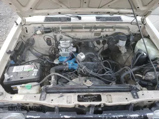 1986 Nissan Hardbody E z VIN JN6ND11S1GW037479, wystawiony jako Copart lot #81775934 z przebiegiem 389 841 mil mil oraz Szkody całkowita. Historia ofert i sprzedaży dostępna na DreamBid. Obrazek 11.
