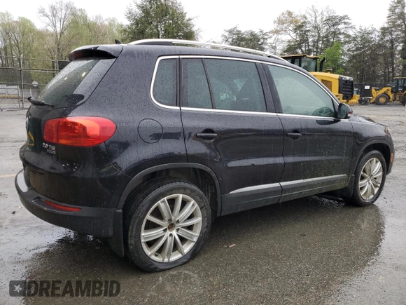2013 Volkswagen Tiguan SE z VIN WVGBV7AX3DW544490, wystawiony jako Copart lot #52632675 z przebiegiem 149 170 mil mil oraz Czysty tytuł • Clean title. Historia ofert i sprzedaży dostępna na DreamBid. Obrazek 3.