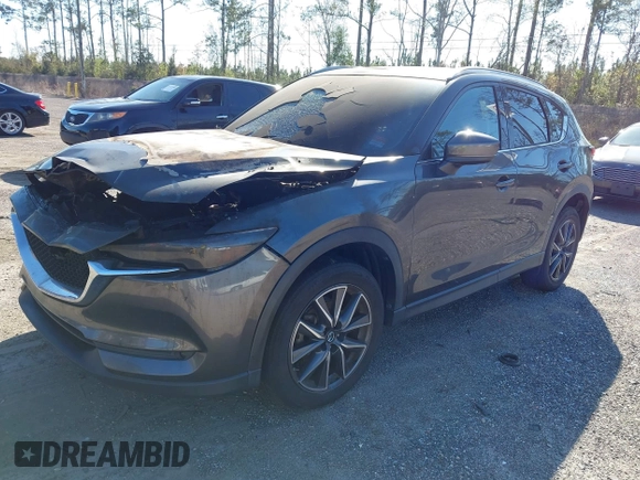2018 Mazda CX-5 Grand Touring with VIN JM3KFADMXJ1402864, listed as a IAAI auction lot 41781188 with 1 mi miles. Bid and sale history available at carsss.com. Image 2.