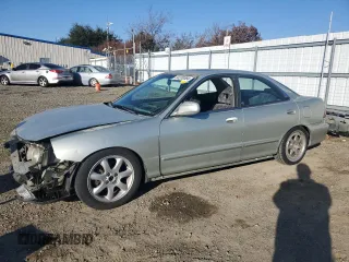 1998 Acura Integra LS with VIN JH4DB7659WS002591, listed as a Copart auction lot 84289584 with 316,458 mi miles and Salvage title. Bid and sale history available at DreamBid. Image 1.