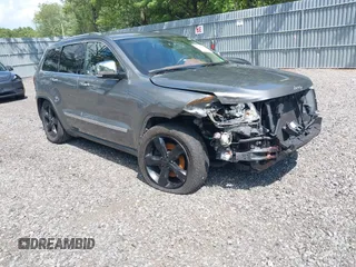 2011 Jeep Grand Cherokee Overland Summit with VIN 1J4RR6GT6BC721239, listed as a IAAI auction lot 42526627 with 200,079 mi miles and . Bid and sale history available at DreamBid. Image 1.