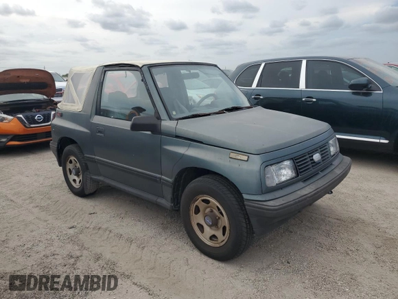 1994 Geo Tracker z VIN 2CNBE18U1R6918878, wystawiony jako Copart lot #75894834 z przebiegiem Nie podano mil oraz Nie do naprawy. Historia ofert i sprzedaży dostępna na DreamBid. Obrazek 4.
