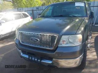 2005 Ford F-150 XLT with VIN 1FTPX14585NB56142, listed as a IAAI auction lot 42168338 with 208,074 mi miles. Bid and sale history available at carsss.com. Image 6.