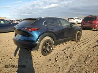 2022 Mazda CX-30 2.5 Turbo with VIN 3MVDMBAY8NM459690, listed as a Copart auction lot 84376874 with 24,723 mi miles and Salvage Title. Bid and sale history available at DreamBid. Image 3.