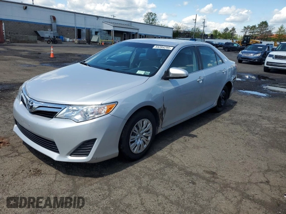 2014 Toyota Camry L with VIN 4T4BF1FK1ER390579, listed as a Copart auction lot 55284295 with 133,926 mi miles and Salvage Title. Bid and sale history available at DreamBid. Image 1.