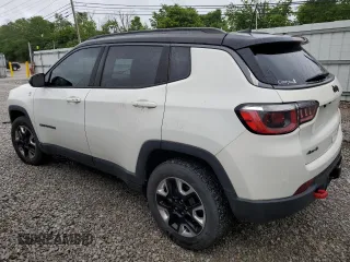 2017 Jeep Compass Trailhawk with VIN 3C4NJDDB2HT646693, listed as a Copart auction lot 58200235 with 62,765 mi miles and Salvage title. Bid and sale history available at DreamBid. Image 2.