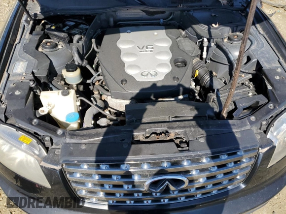 2005 Infiniti FX z VIN JNRAS08WX5X204374, wystawiony jako Copart lot #47408985 z przebiegiem 200 548 mil mil oraz Szkoda całkowita • Salvage title. Historia ofert i sprzedaży dostępna na DreamBid. Obrazek 12.