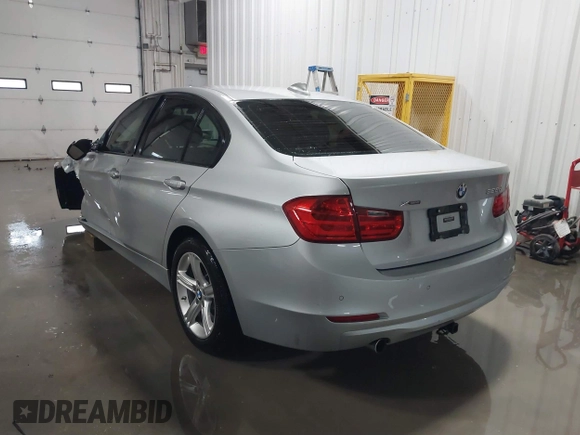 2014 BMW 3 Series 328d xDrive with VIN WBA3D5C55EF147308, listed as a IAAI auction lot 41499435 with 104,941 mi miles. Bid and sale history available at carsss.com. Image 3.