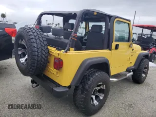 2002 Jeep Wrangler Sport with VIN 1J4FA49S12P746058, listed as a Copart auction lot 75060604 with Not Provided miles and Non Repairable. Bid and sale history available at carsss.com. Image 3.