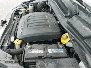 2014 Dodge Grand Caravan American Value with VIN 2C4RDGBG7ER340581, listed as a IAAI auction lot 42673357 with 106,997 mi miles and . Bid and sale history available at DreamBid. Image 24.