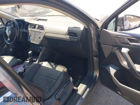 2019 Volkswagen Tiguan SE with VIN 3VV2B7AX3KM143968, listed as a IAAI auction lot 39838788 with 155,823 mi miles and . Bid and sale history available at DreamBid. Image 5.