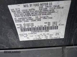 2014 Ford Taurus Limited with VIN 1FAHP2F81EG113984, listed as a IAAI auction lot 41542792 with 213,206 mi miles. Bid and sale history available at carsss.com. Image 9.