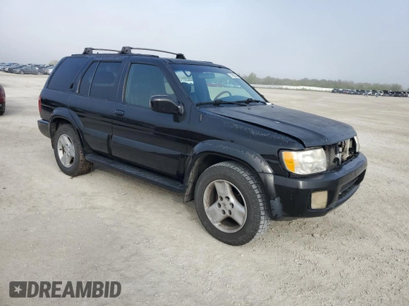 2001 Infiniti QX4 with VIN JNRDR09X21W204207, listed as a Copart auction lot 79935604 with Not Provided miles and Salvage Title. Bid and sale history available at DreamBid. Image 4.