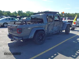 2022 Jeep Gladiator High Altitude with VIN 1C6HJTFG6NL152173, listed as a IAAI auction lot 42524638 with 17,148 mi miles and . Bid and sale history available at DreamBid. Image 4.