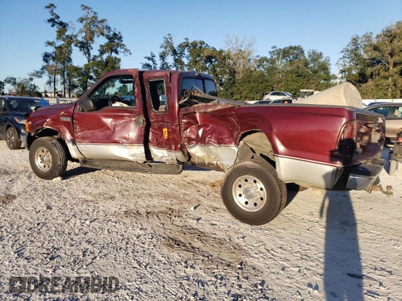 2000 Ford F-250 XL with VIN 1FTNX21L6YEE29549, listed as a Copart auction lot 74982324 with 133,883 mi miles and Salvage title. Bid and sale history available at DreamBid. Image 2.