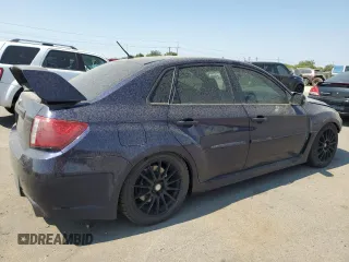 2012 Subaru Impreza Sedan WRX WRX STI with VIN JF1GV8J63CL027705, listed as a Copart auction lot 67888884 with 0 mi miles and Salvage Title. Bid and sale history available at carsss.com. Image 3.