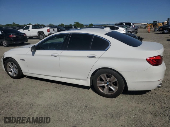 2013 BMW 5 Series 528i with VIN WBAXG5C58DD229195, listed as a Copart auction lot 52193215 with 74,240 mi miles and Salvage Title. Bid and sale history available at carsss.com. Image 2.