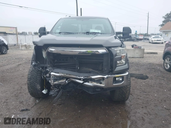 2015 Ford F-150 XLT z VIN 1FTFX1EG2FFA85236, wystawiony jako IAAI lot #41401898 z przebiegiem 170 730 mil mil oraz . Historia ofert i sprzedaży dostępna na DreamBid. Obrazek 6.