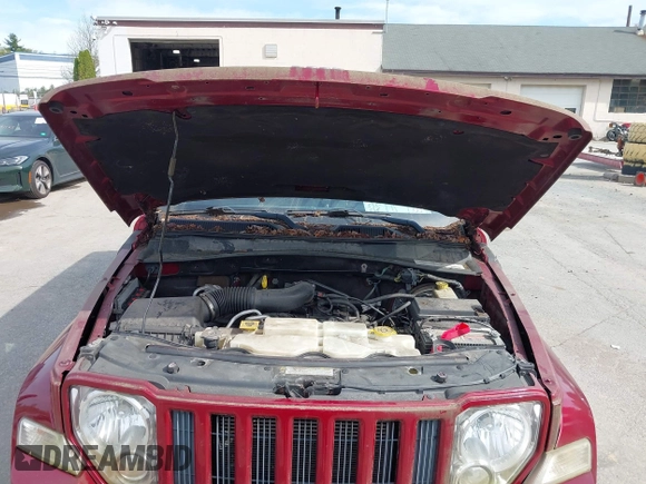 2012 Jeep Liberty Sport with VIN 1C4PJMAK0CW122555, listed as a IAAI auction lot 42210616 with 84,595 mi miles and . Bid and sale history available at DreamBid. Image 10.