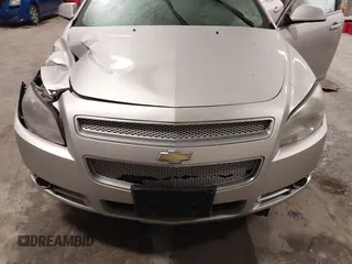 2012 Chevrolet Malibu LTZ with VIN 1G1ZG5E77CF375464, listed as a IAAI auction lot 41509140 with 197,329 mi miles and . Bid and sale history available at DreamBid. Image 12.