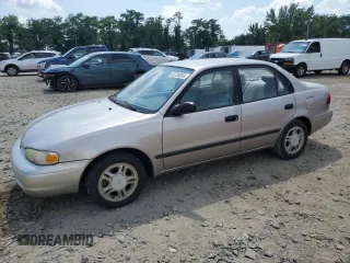 2000 Chevrolet Prizm with VIN 1Y1SK5487YZ408093, listed as a Copart auction lot 65705355 with 143,283 mi miles and Salvage title. Bid and sale history available at DreamBid. Image 1.