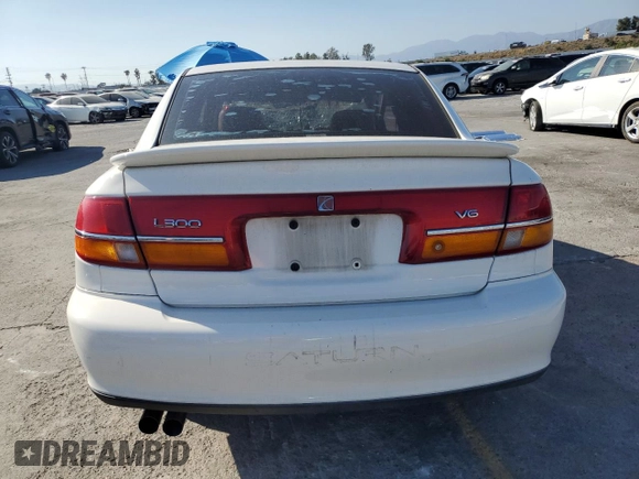 2002 Saturn LS z VIN 1G8JW54R52Y566288, wystawiony jako Copart lot #56321595 z przebiegiem Nie podano mil oraz Szkody całkowita. Historia ofert i sprzedaży dostępna na DreamBid. Obrazek 6.
