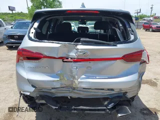 2022 Hyundai Santa Fe SE with VIN 5NMS14AJ7NH393037, listed as a IAAI auction lot 42276818 with 77,656 mi miles and . Bid and sale history available at DreamBid. Image 17.