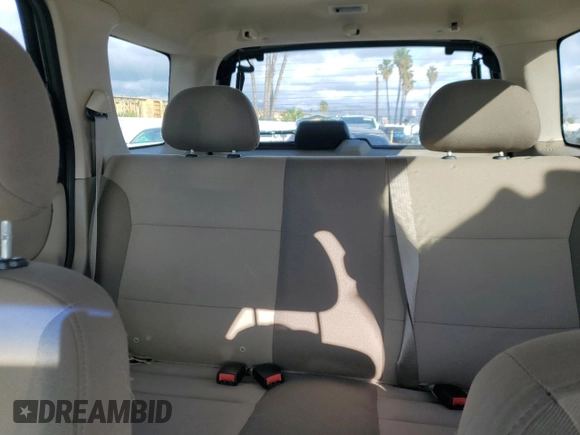 2004 Ford Escape XLS with VIN 1FMYU021X4KA41111, listed as a Copart auction lot 45393765 with 125,492 mi miles and Salvage Title. Bid and sale history available at DreamBid. Image 10.