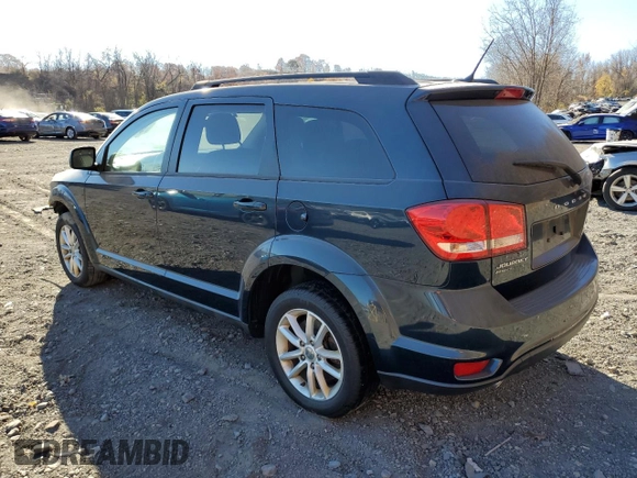 2013 Dodge Journey SXT with VIN 3C4PDDBG7DT505871, listed as a Copart auction lot 54657255 with 118,395 mi miles and Non Repairable. Bid and sale history available at DreamBid. Image 2.