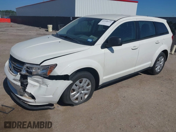 2014 Dodge Journey SE with VIN 3C4PDCAB2ET258681, listed as a IAAI auction lot 42558132 with 136,569 mi miles and . Bid and sale history available at DreamBid. Image 2.