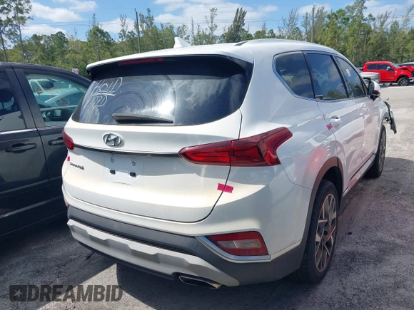 2019 Hyundai Santa Fe SEL with VIN 5NMS33AD0KH006550, listed as a IAAI auction lot 41894306 with 80,920 mi miles and . Bid and sale history available at DreamBid. Image 4.