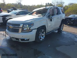 2015 Chevrolet Tahoe LTZ with VIN 1GNSCCKC4FR171824, listed as a IAAI auction lot 41121478 with 1 mi miles. Bid and sale history available at carsss.com. Image 2.