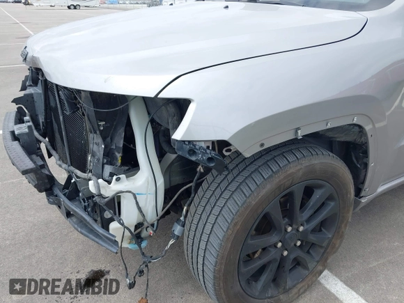 2017 Jeep Grand Cherokee Laredo with VIN 1C4RJFAG1HC701921, listed as a IAAI auction lot 42164963 with 135,039 mi miles and . Bid and sale history available at DreamBid. Image 18.