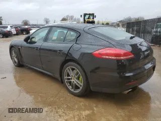 2015 Porsche Panamera S E-Hybrid z VIN WP0AD2A7XFL040092, wystawiony jako Copart lot #85878734 z przebiegiem 89 354 mil mil oraz Tytuł czysty. Historia ofert i sprzedaży dostępna na DreamBid. Obrazek 2.