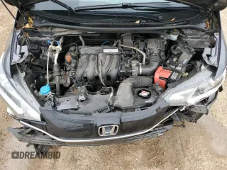 2015 Honda Fit EX-L z VIN 3HGGK5H85FM763929, wystawiony jako Copart lot #60808125 z przebiegiem 79 441 mil mil oraz Szkoda całkowita • Salvage title. Historia ofert i sprzedaży dostępna na DreamBid. Obrazek 11.