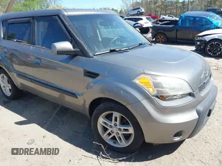 2010 Kia Soul + with VIN KNDJT2A20A7163134, listed as a IAAI auction lot 42164478 with 207,790 mi miles. Bid and sale history available at carsss.com. Image 1.