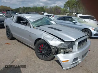 2013 Ford Mustang GT with VIN 1ZVBP8CFXD5233165, listed as a IAAI auction lot 41913971 with 181,914 mi miles. Bid and sale history available at carsss.com. Image 1.