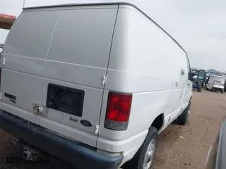 2011 Ford Econoline Cargo Van Commercial with VIN 1FTNE2ELXBDA20810, listed as a IAAI auction lot 41799682 with 206,083 mi miles. Bid and sale history available at carsss.com. Image 4.