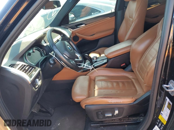 2019 BMW X4 xDrive30i with VIN 5UXUJ3C50KLG51848, listed as a Copart auction lot 43208485 with 130,340 mi miles and Salvage Title. Bid and sale history available at carsss.com. Image 7.