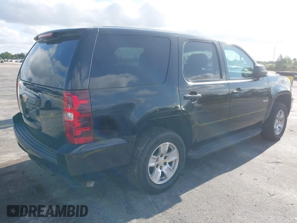 2013 Chevrolet Tahoe Commercial z VIN 1GNLC2E05DR218100, wystawiony jako IAAI lot #42182072 z przebiegiem 162 888 mil mil oraz . Historia ofert i sprzedaży dostępna na DreamBid. Obrazek 4.