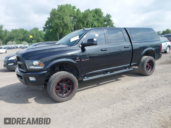 2015 Ram 2500 Laramie with VIN 3C6UR5FL0FG655552, listed as a IAAI auction lot 42456897 with 143,885 mi miles and . Bid and sale history available at DreamBid. Image 2.