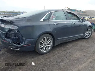 2013 Lincoln MKZ with VIN 3LN6L2JK2DR823639, listed as a IAAI auction lot 42048602 with 68,939 mi miles and . Bid and sale history available at DreamBid. Image 4.
