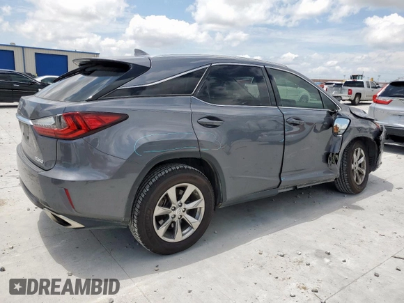 2016 Lexus RX 350 with VIN 2T2BZMCA4GC032889, listed as a Copart auction lot 62351685 with 114,556 mi miles and Salvage title. Bid and sale history available at DreamBid. Image 3.