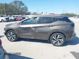 2015 Nissan Murano Platinum z VIN 5N1AZ2MG7FN230347, wystawiony jako IAAI lot #41545220 z przebiegiem 134 435 mil mil oraz . Historia ofert i sprzedaży dostępna na DreamBid. Obrazek 15.