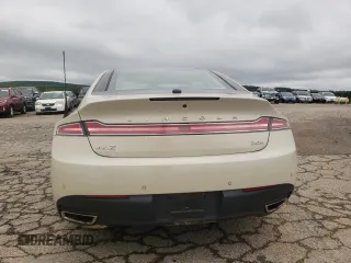 2014 Lincoln MKZ Hybrid with VIN 3LN6L2LU4ER808818, listed as a Copart auction lot 57411395 with 95,775 mi miles and Salvage title. Bid and sale history available at DreamBid. Image 6.