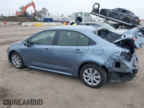 2023 Toyota Corolla Hybrid LE with VIN JTDBCMFE8PJ013271, listed as a IAAI auction lot 42099797 with 14,080 mi miles and . Bid and sale history available at carsss.com. Image 15.