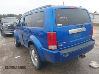 2008 Dodge Nitro SLT with VIN 1D8GU58K58W177983, listed as a IAAI auction lot 41447138 with 184,004 mi miles. Bid and sale history available at carsss.com. Image 3.
